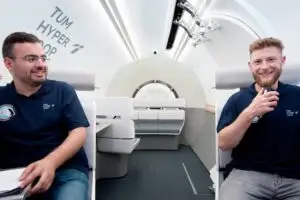 Picture of the two first passengers traveling with a hyperloop at the TUM Hyperloop Demonstrator